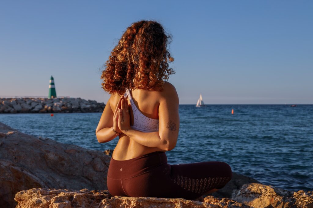 A photo of Moriah from Unrivaled Health contemplating the health benefits of Clean Nutra Magnesium Complex.